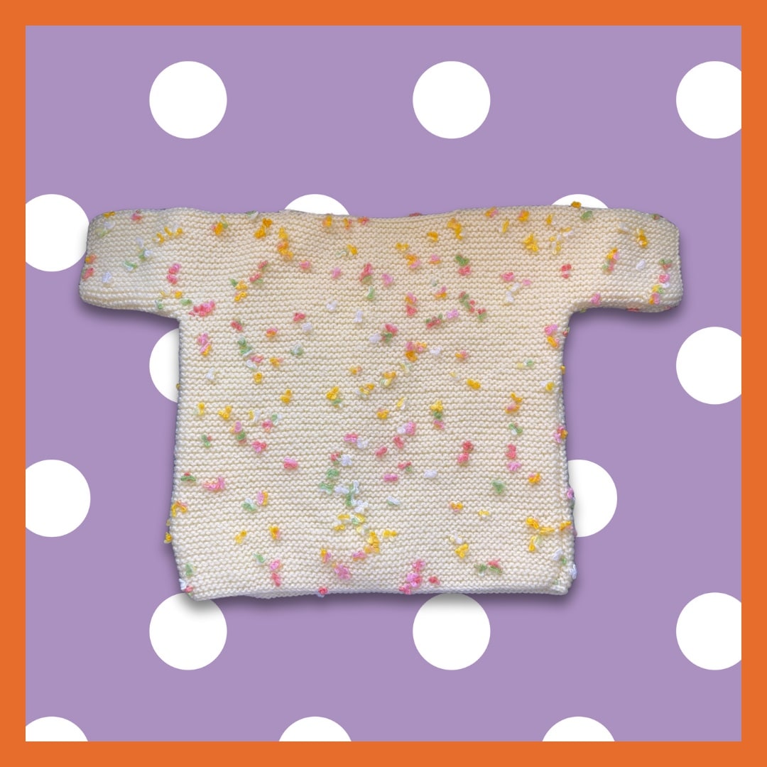 Yellow sweater with multicolor dots