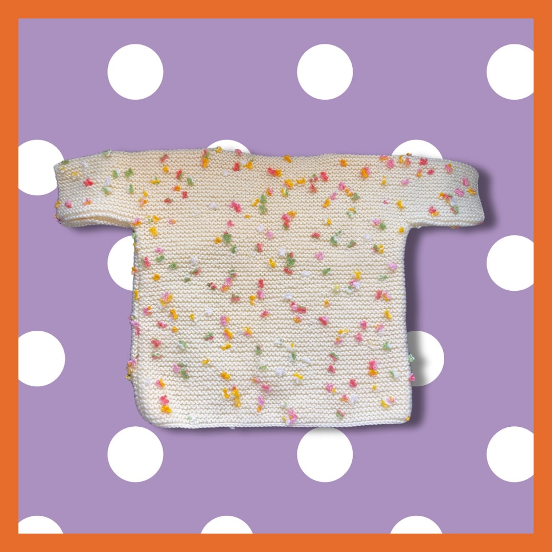 Yellow sweater with multicolor dots