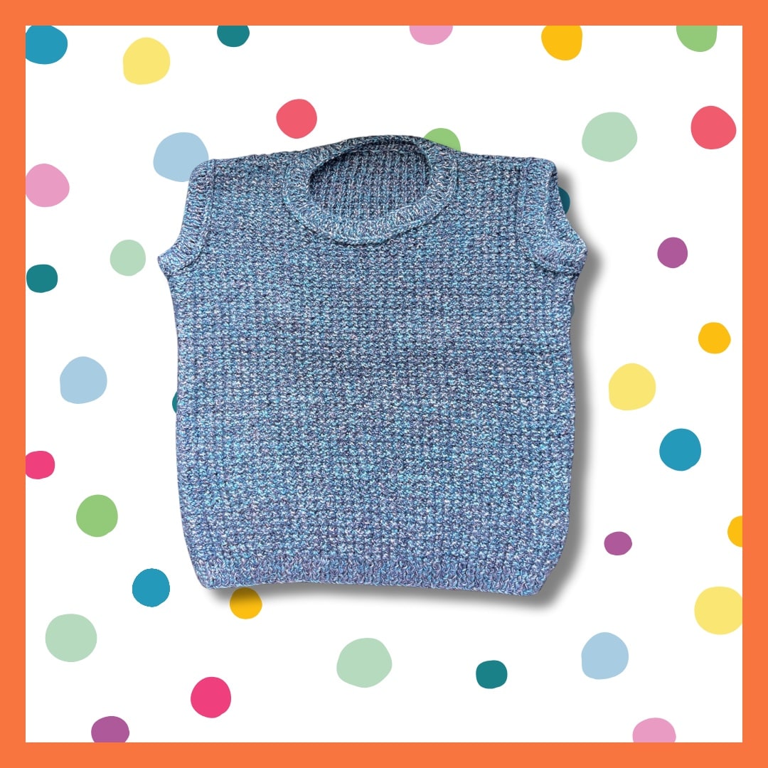 Sleeveless sweater with blue tones