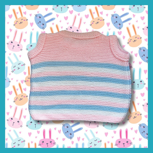 Pink sweater with white and blue stripes