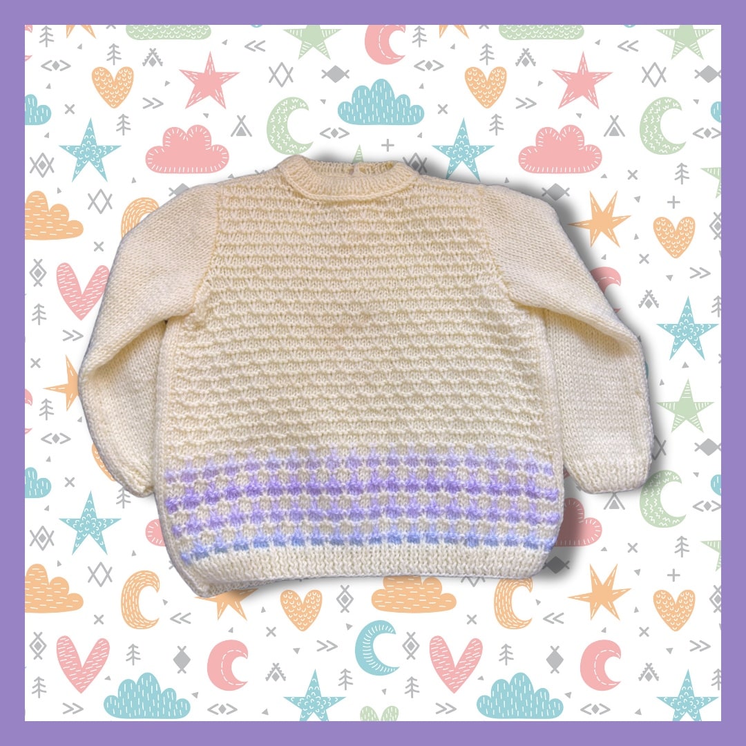 Yellow kids sweater with patterns