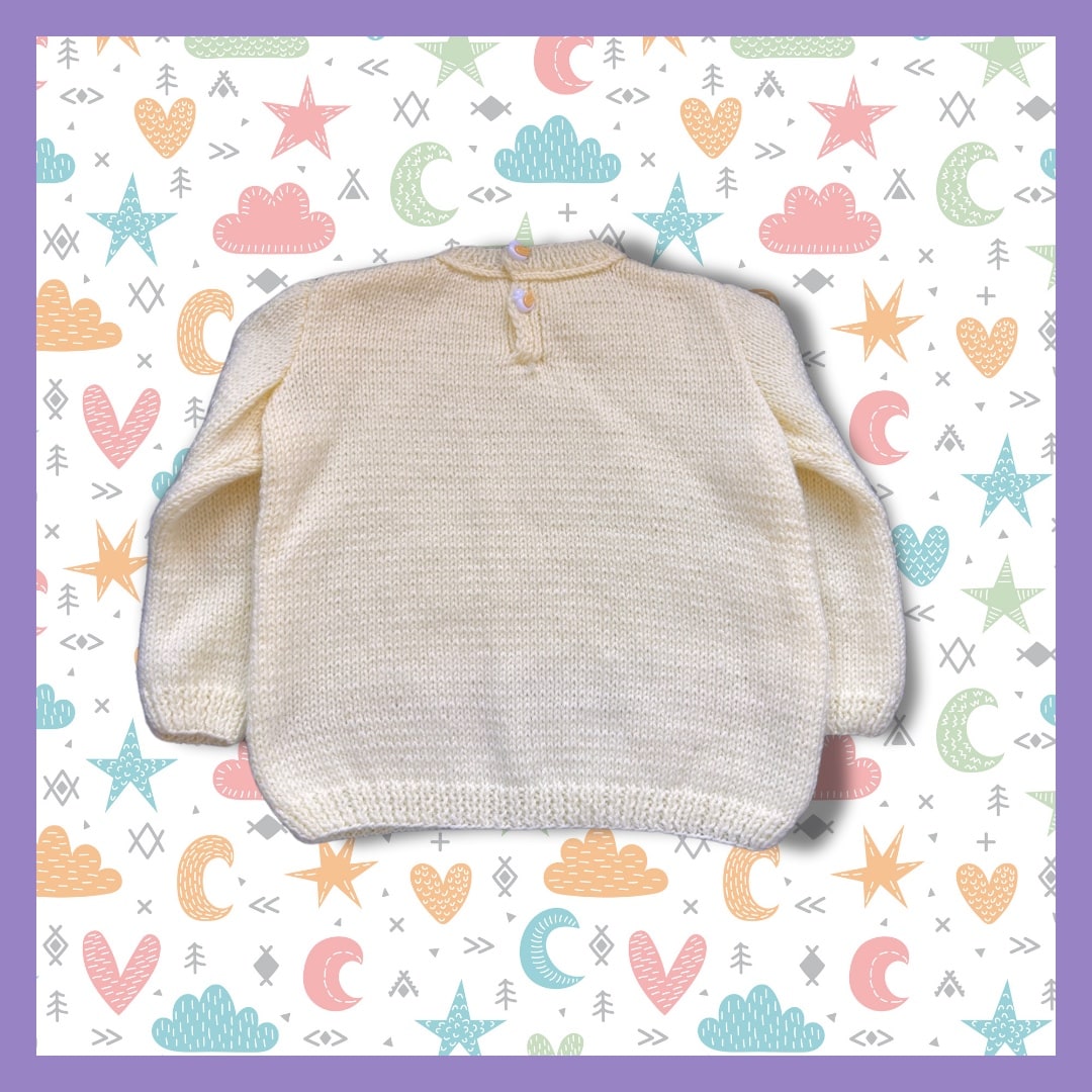 Yellow kids sweater with patterns