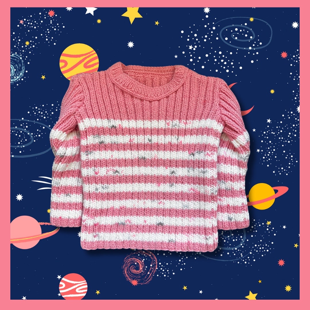 Pink sweater with white and pink stripes
